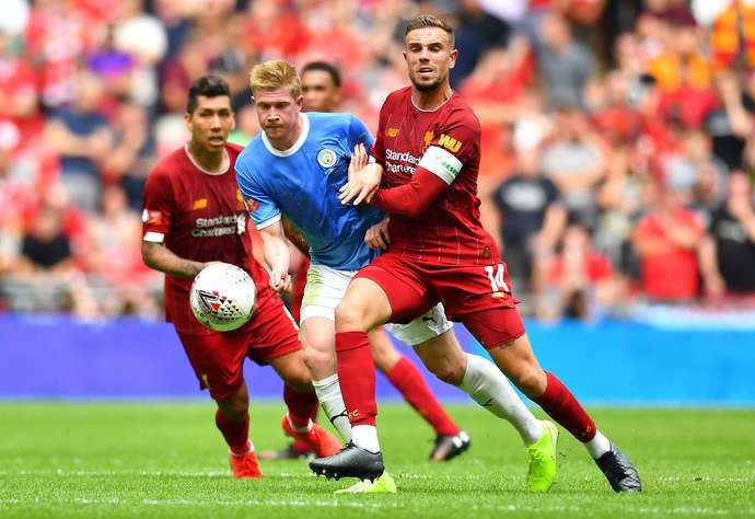 Henderson and De Bruyne battle for Liverpool and Man City