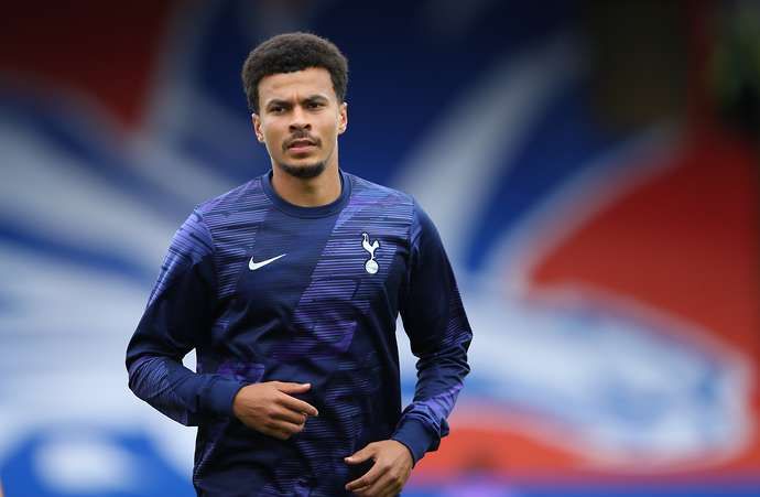 Dele Alli warms up