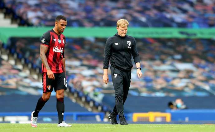 Eddie Howe trudges off the pitch following relegation