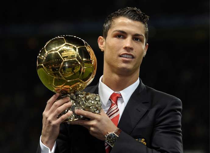 Ronaldo with the Ballon d'Or at Man Utd