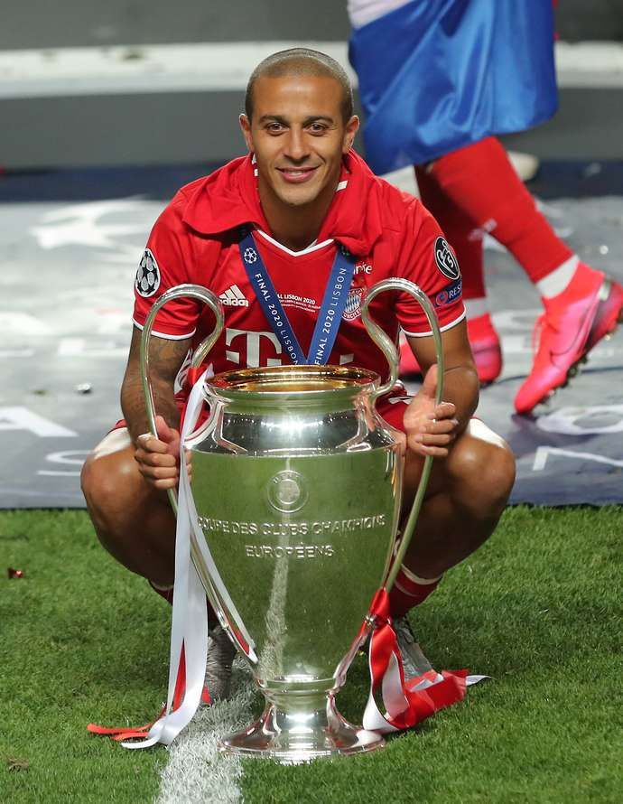 Thiago with the Champions League trophy