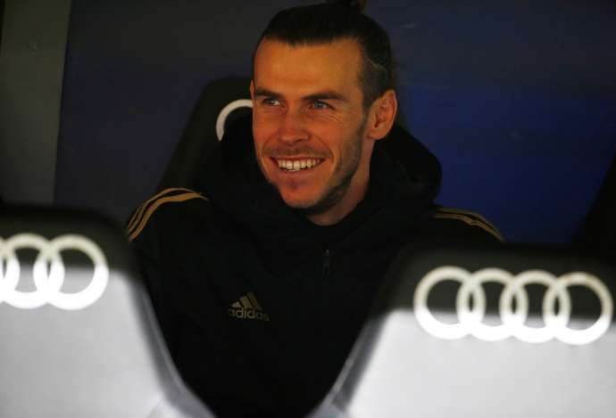 Bale famously loves a round of golf