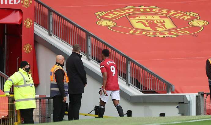 Anthony Martial heads down the tunnel after being sent off
