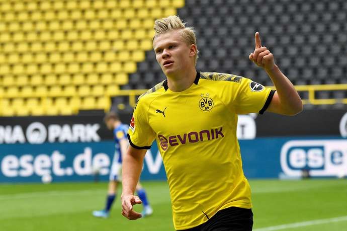 Erling Haaland celebrates scoring for Dortmund