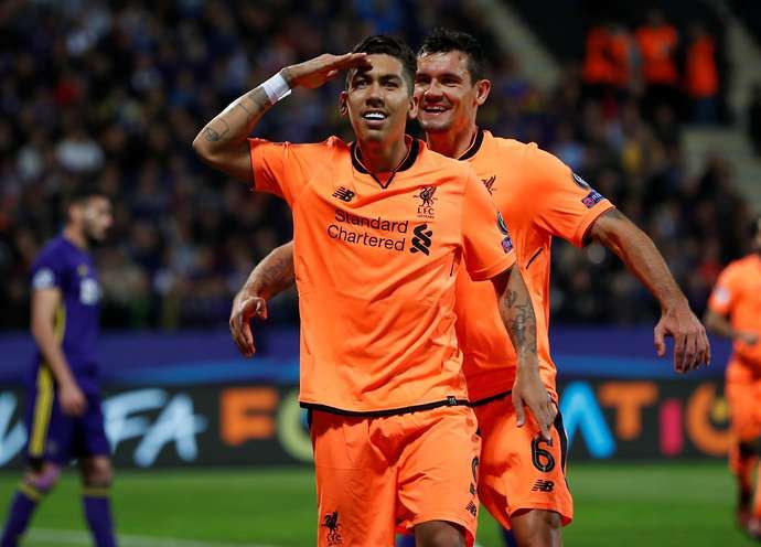 Firmino celebrates scoring for Liverpool