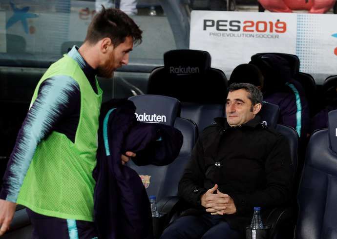 Lionel Messi and Ernesto Valverde