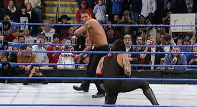 Orton caught 'Taker flush with a chair