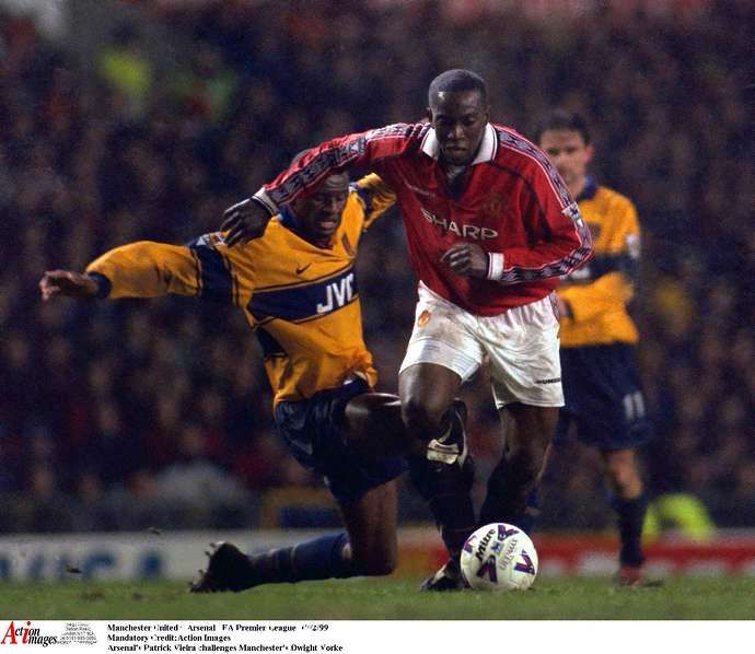 Arsenal's Patrick Vieira challenges Manchester United's Dwight Yorke
