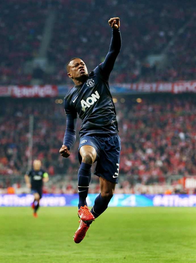 Patrice Evra celebrates his goal vs Bayern in 2014