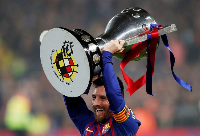 Messi with the La Liga trophy
