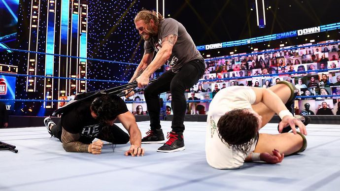 Edge attacked both Reigns and Bryan on SmackDown