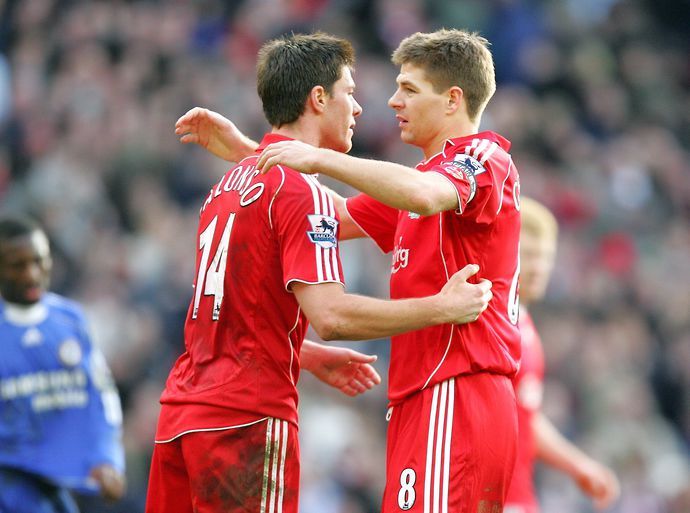 Alonso and Gerrard embrace