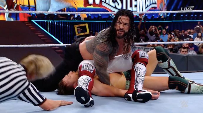 Reigns pinned Bryan and Edge at the same time at WrestleMania