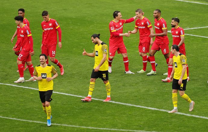 Lars Bender celebrates scoring vs Dortmund