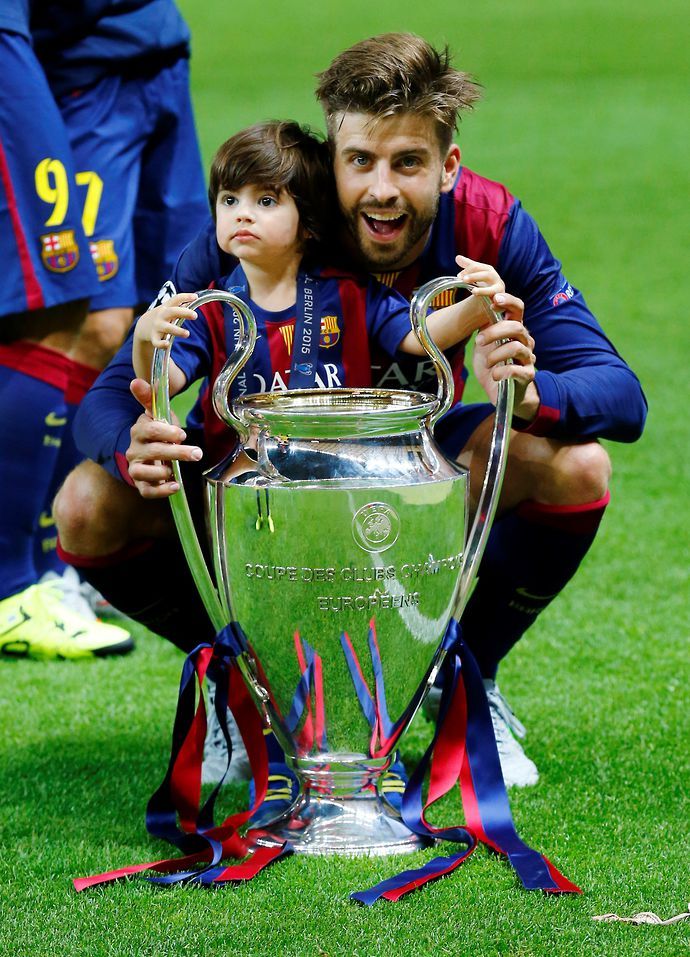 Pique with the CL trophy