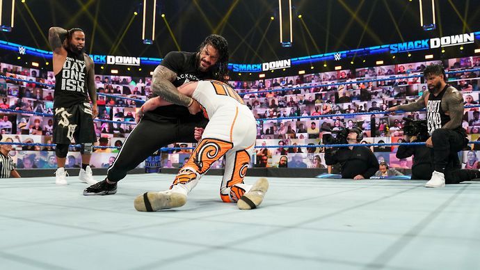 Reigns beat up Mysterio's son