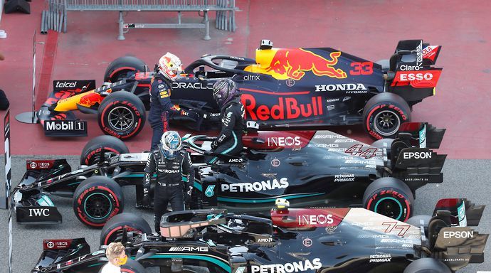 Mercedes' Lewis Hamilton shakes hands with Red Bull's Max Verstappen after qualifying