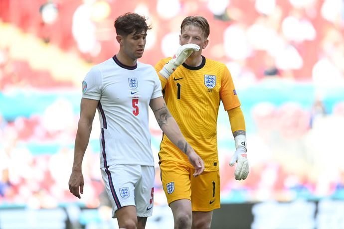 John Stones and Jordan Pickford in action for England