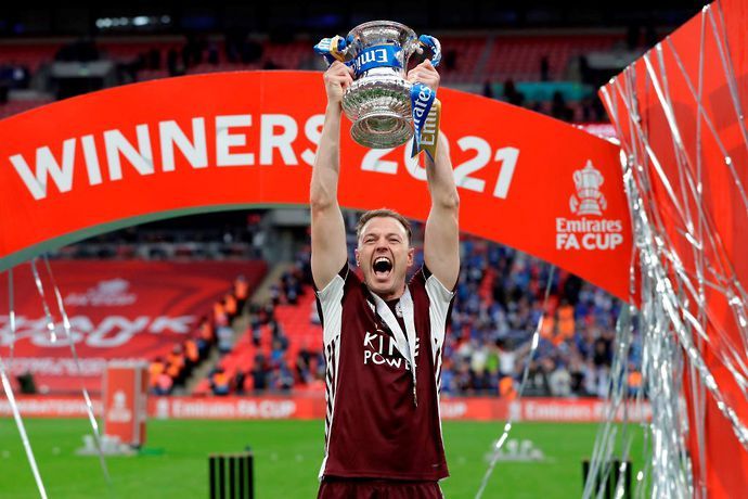 Jonny Evans celebrates winning the FA Cup with Leicester City