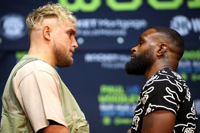 Jake Paul (L) and Tyron Woodley (R) face off during a press conference before their cruiserweight fight at The Novo by Microsoft at L.A. Live on July 13, 2021 in Los Angeles, California. (Photo by Kat