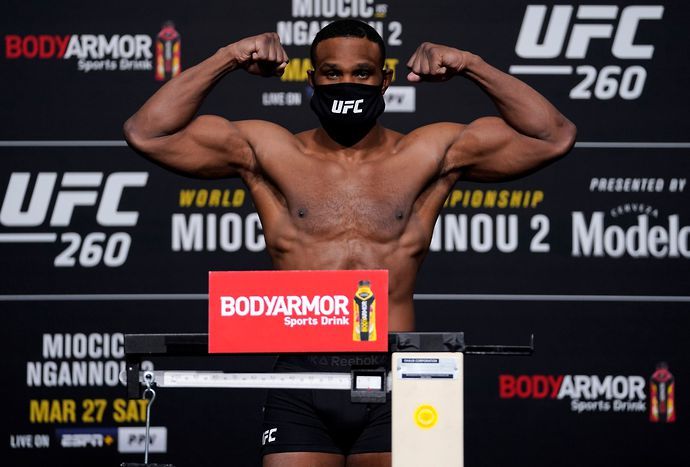 n this handout photo provided by UFC, Tyron Woodley poses on the scale during the UFC 260 weigh-in at UFC APEX on March 26, 2021 in Las Vegas, Nevada. (Photo by Jeff Bottari/Zuffa LLC)