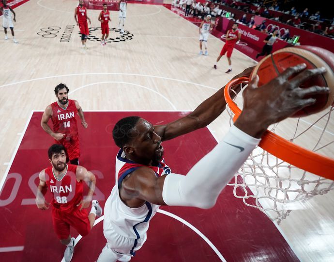 Bam Adebayo #13 of Team United States dunks against Islamic Republic of Iran during the first half of a Men's Preliminary Round Group A game on day five of the Tokyo 2020 Olympic Games at Saitama Supe
