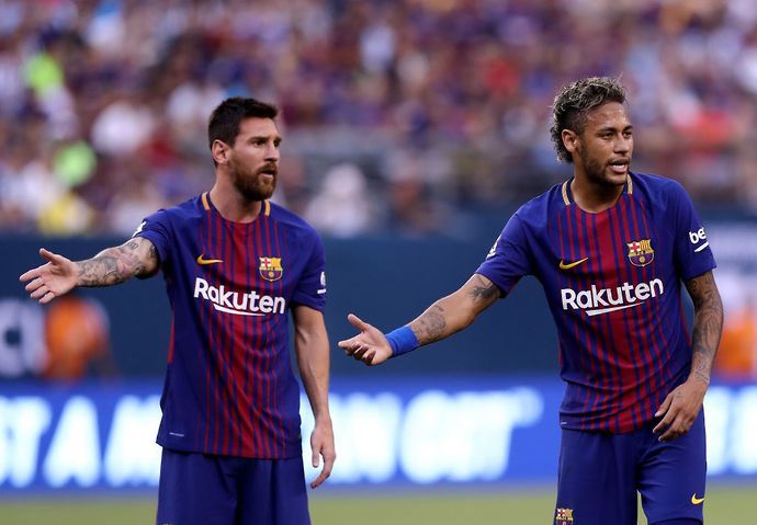 Neymar and Lionel Messi in action for Barcelona