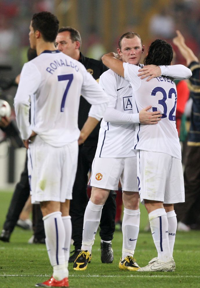 Cristiano Ronaldo, Wayne Rooney and Carlos Tevez in action for Man United