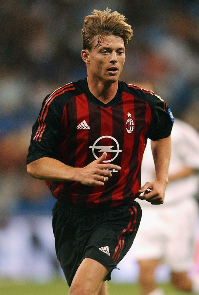 Jon Dahl Tomasson in action for AC Milan