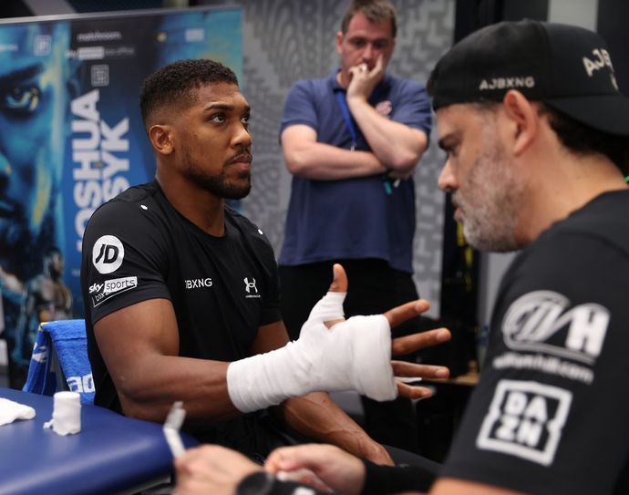 Anthony Joshua gets his hands wrapped by Ian Gatt