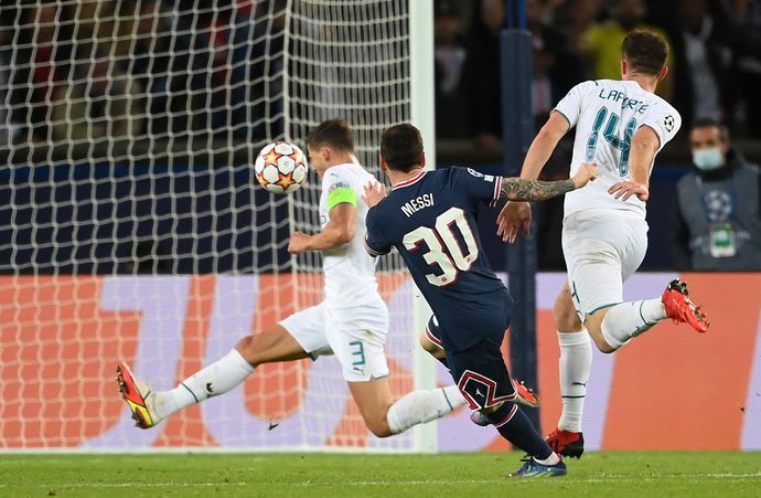 Lionel Messi of Paris Saint-Germain scores their side's second goal during the UEFA Champions League group A match between Paris Saint-Germain and Manchester City