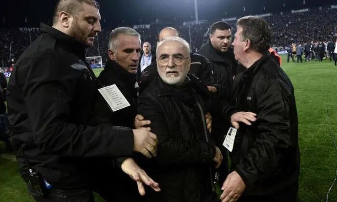 PAOK owner Ivan Savvidis was quickly apprehended by officials when he stormed the pitch