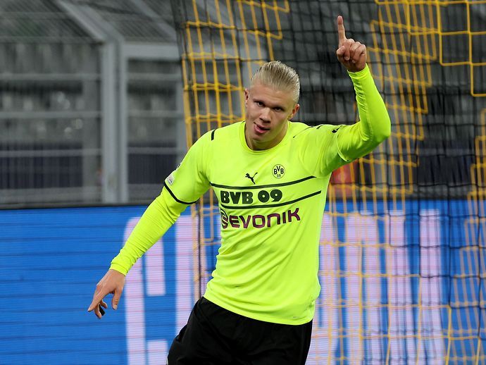 Erling Haaland celebrates scoring for Dortmund
