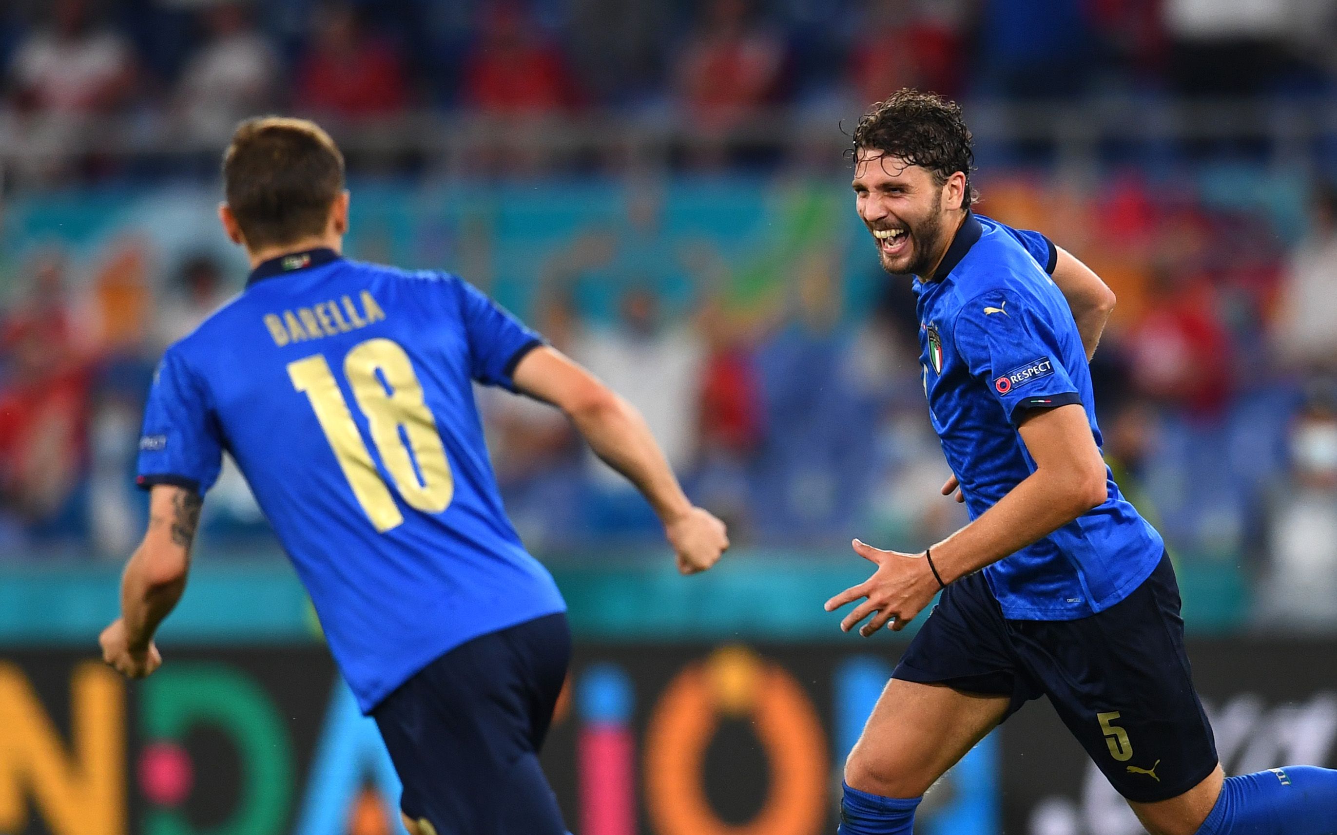 Manuel Locatelli of Italy celebrates with Nicolo Barella after scoring for their side in EURO 2020