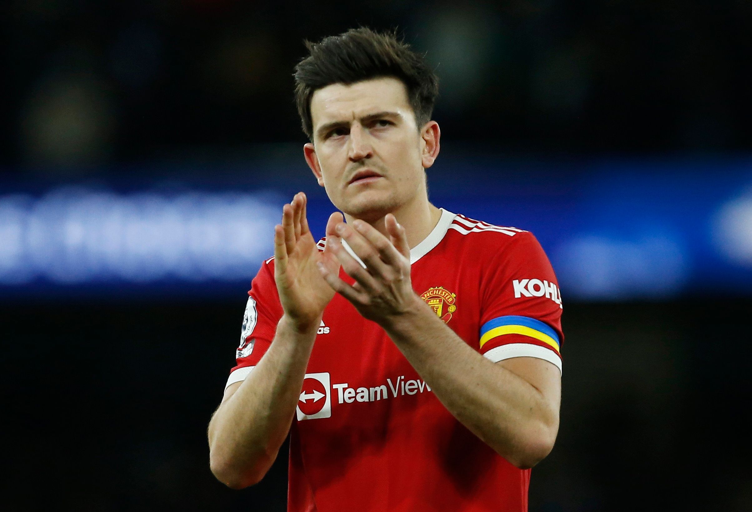 Man Utd's Maguire clapping.