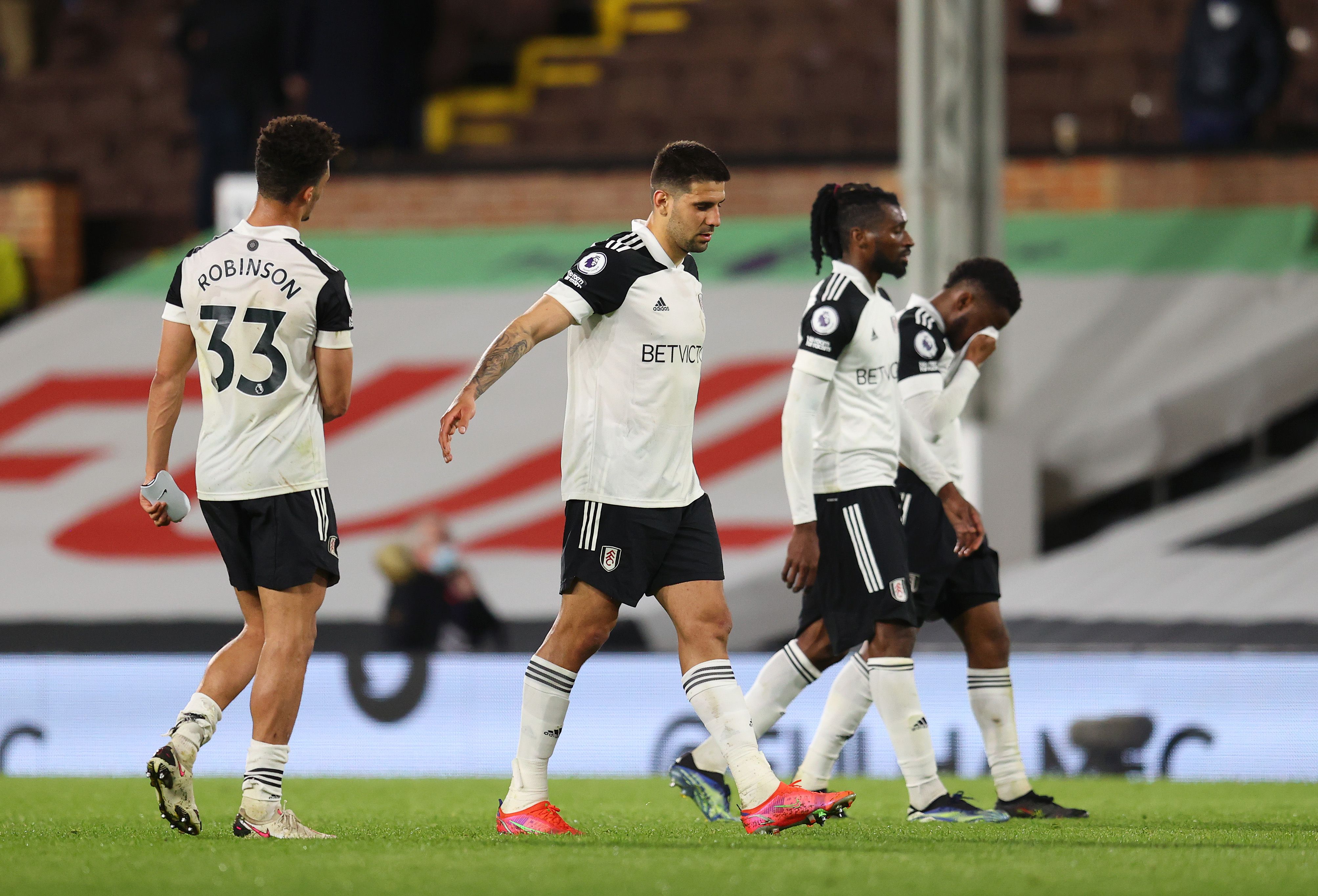 Aleksandar Mitrovic of Fulham looks dejected after defeat as Fulham are relegated 