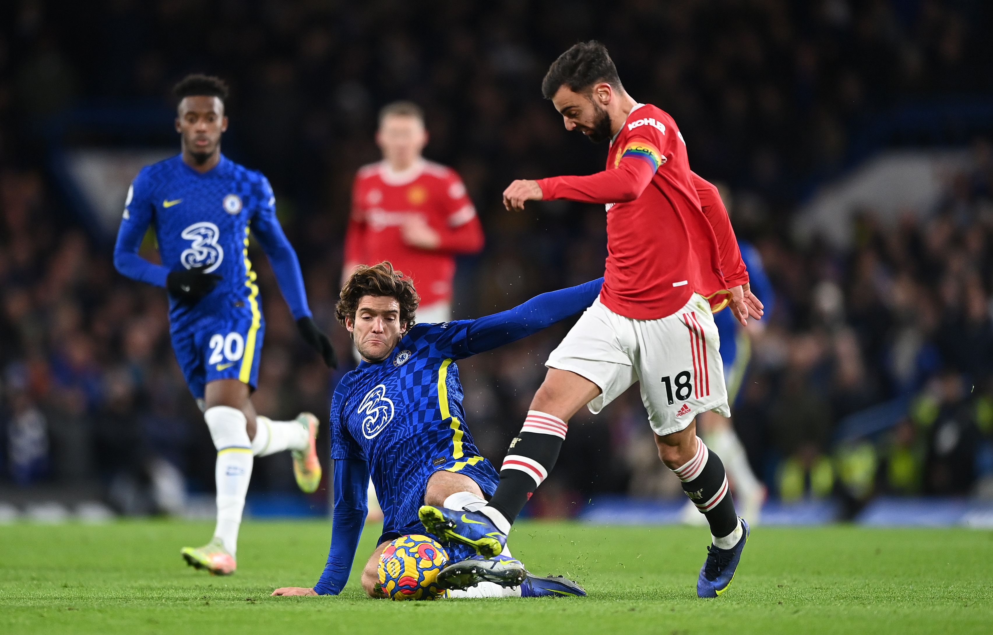 Bruno Fernandes tackled by Marcos Alonso