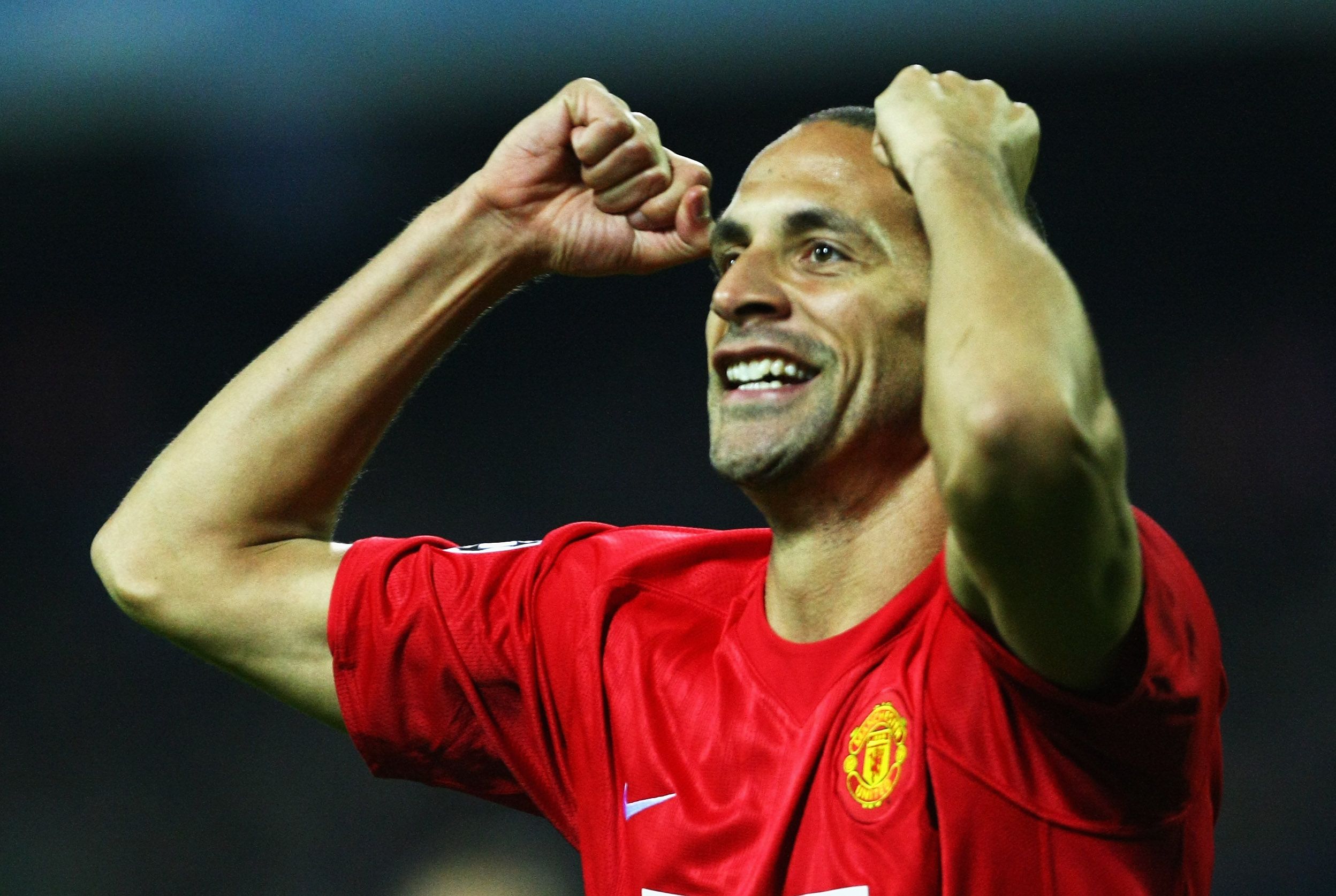 Rio Ferdinand celebrates for Man United