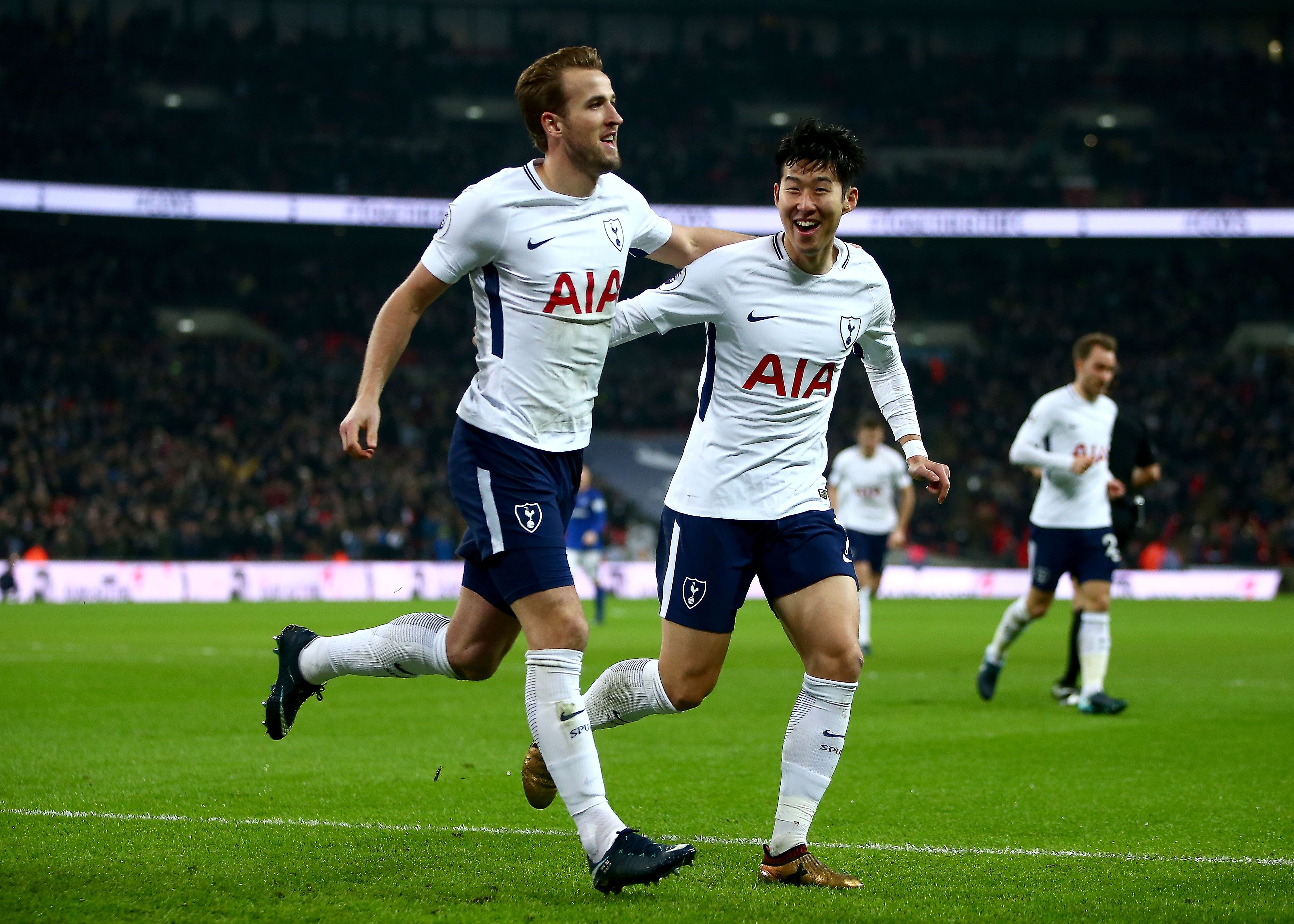 Harry Kane of Tottenham Hotspur celebrates with teammate Heung-Min Son.