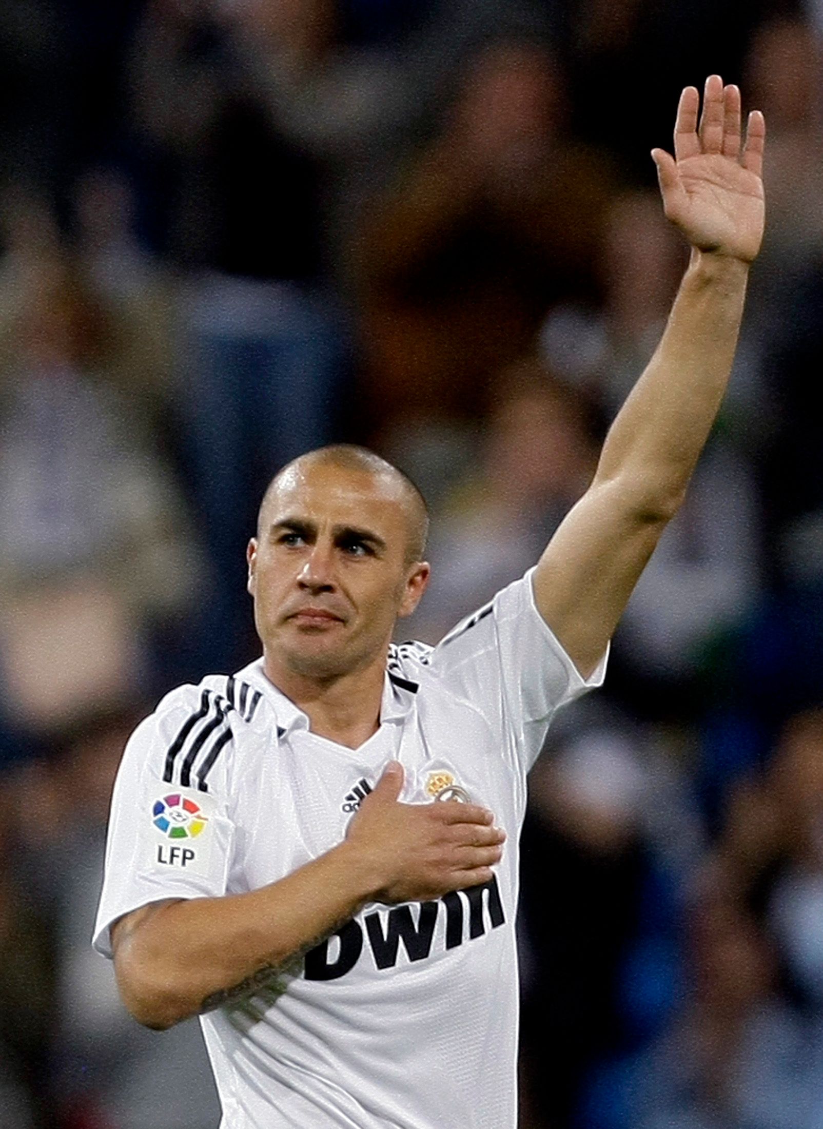 Cannavaro salutes Real Madrid fans.