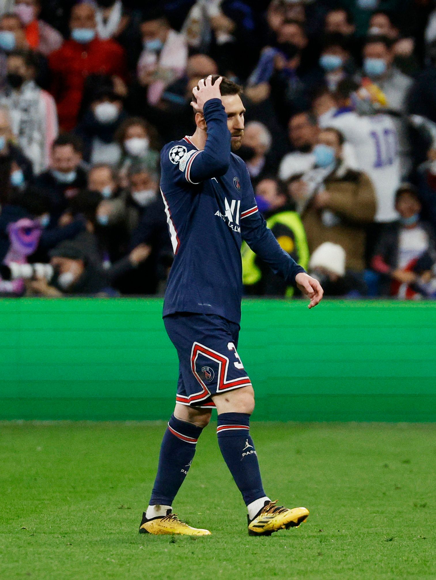 PSG's Messi looks frustrated.
