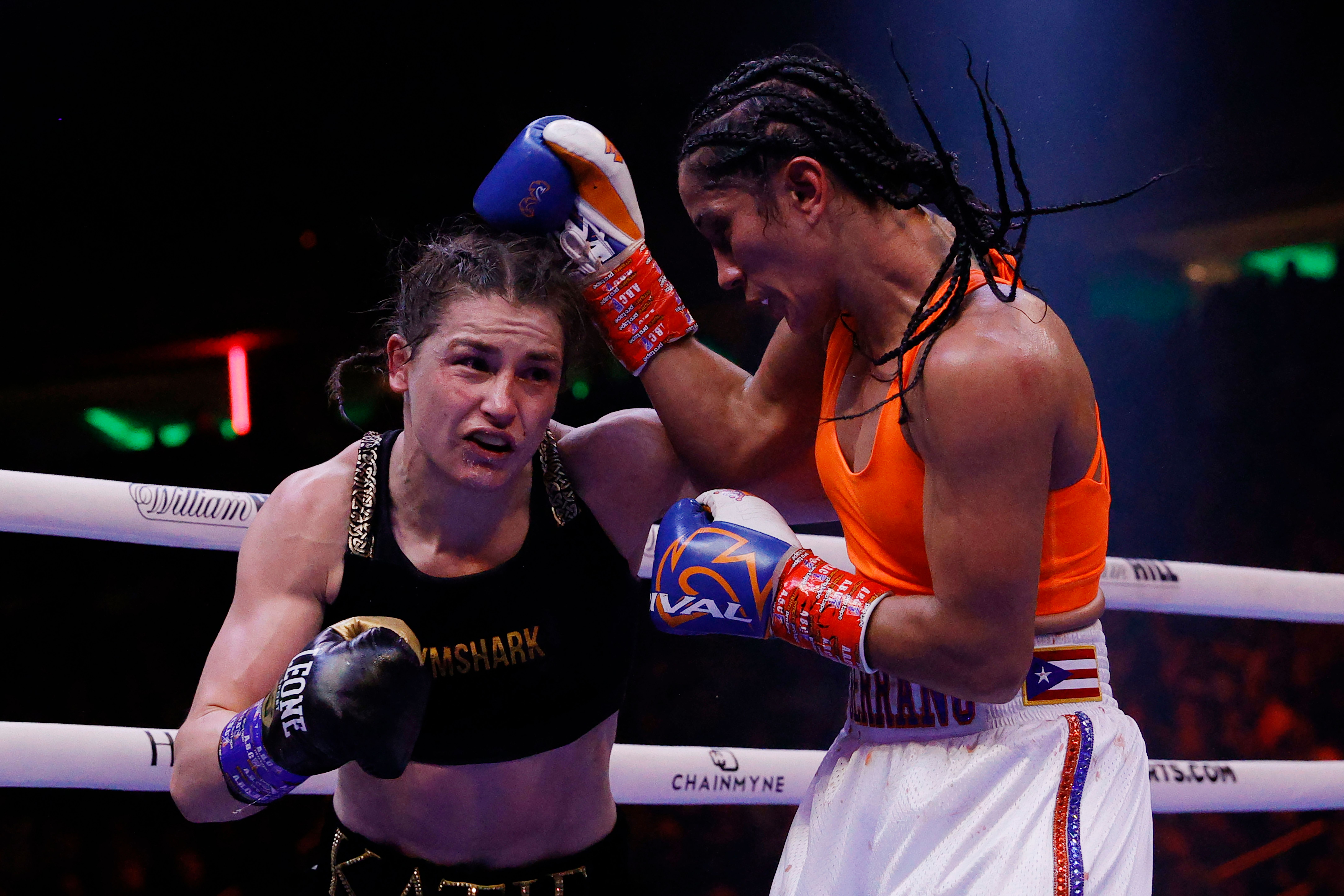 Amanda Serrano and Katie Taylor trade punches