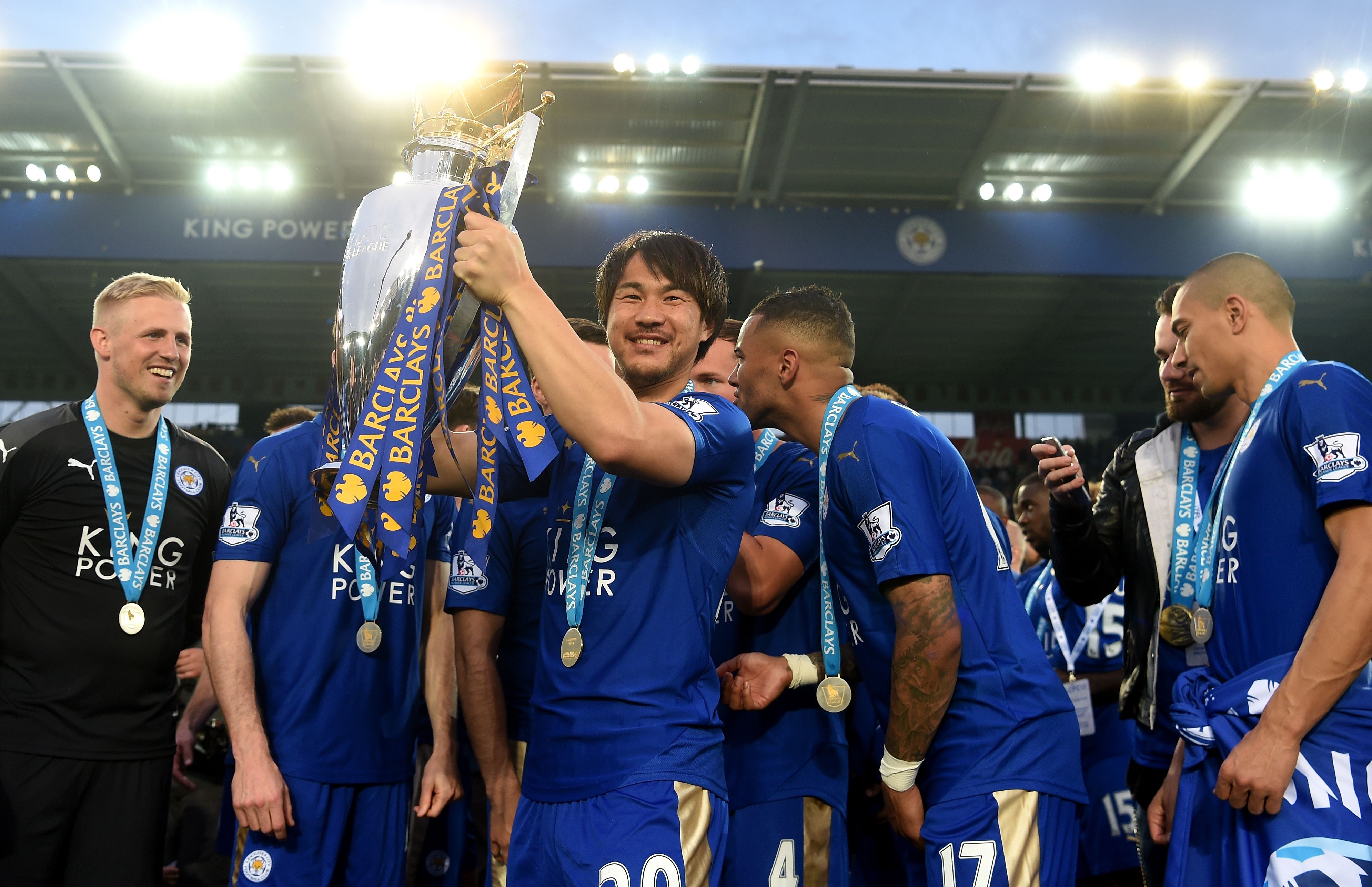 Shinji Okazaki of Leicester City lifts the Premier League Trophy.