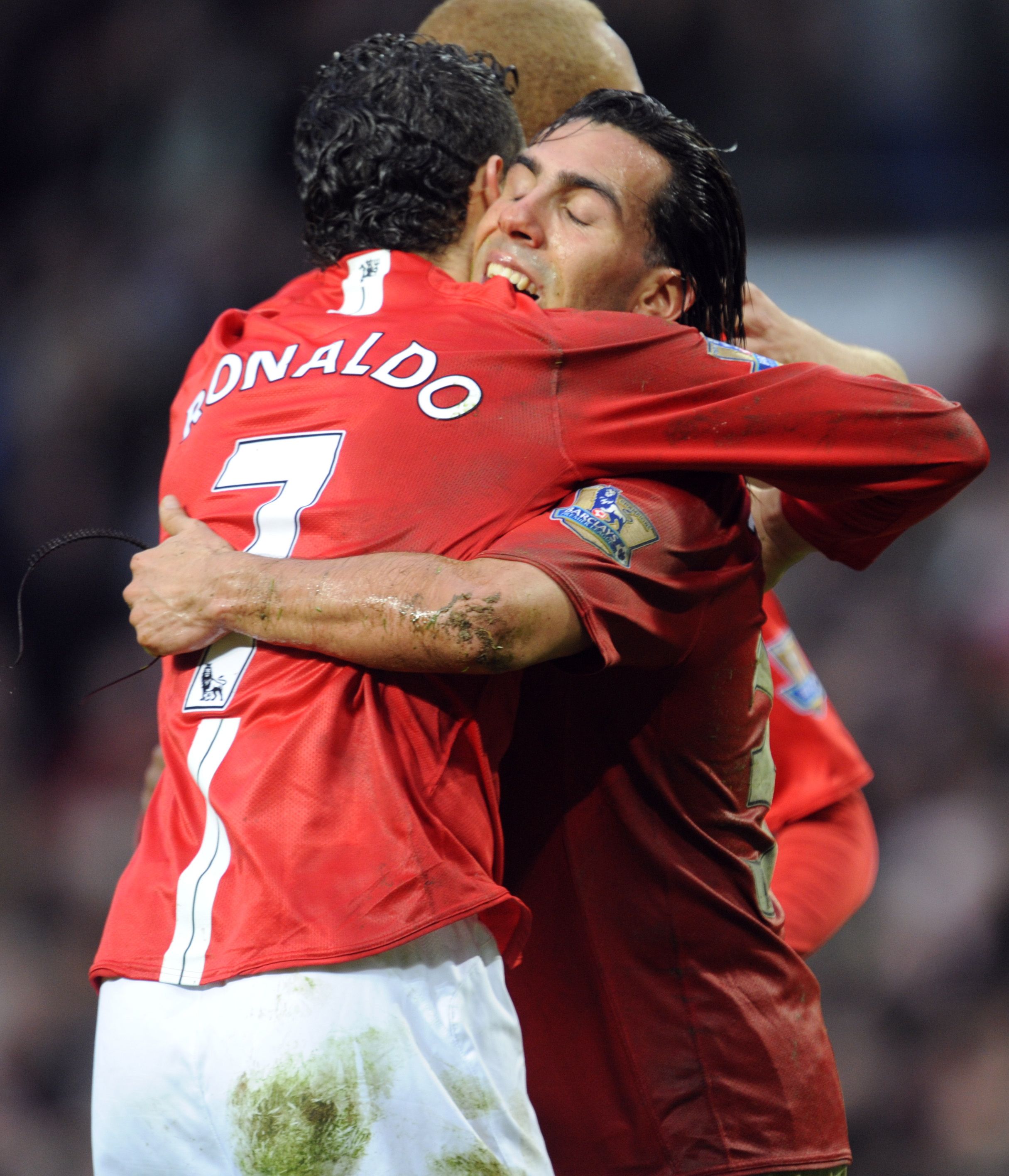 Tevez and Ronaldo celebrate.
