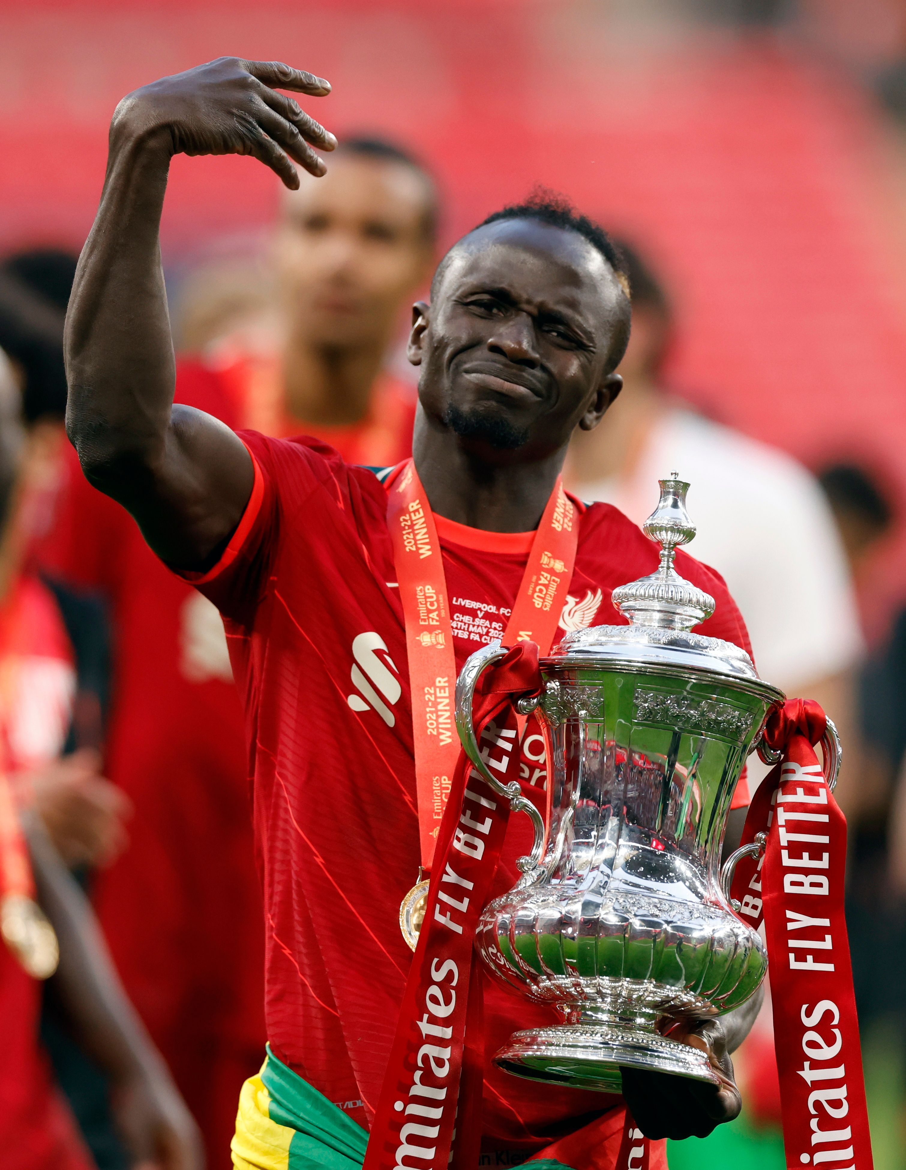 Mane lifts the FA Cup.