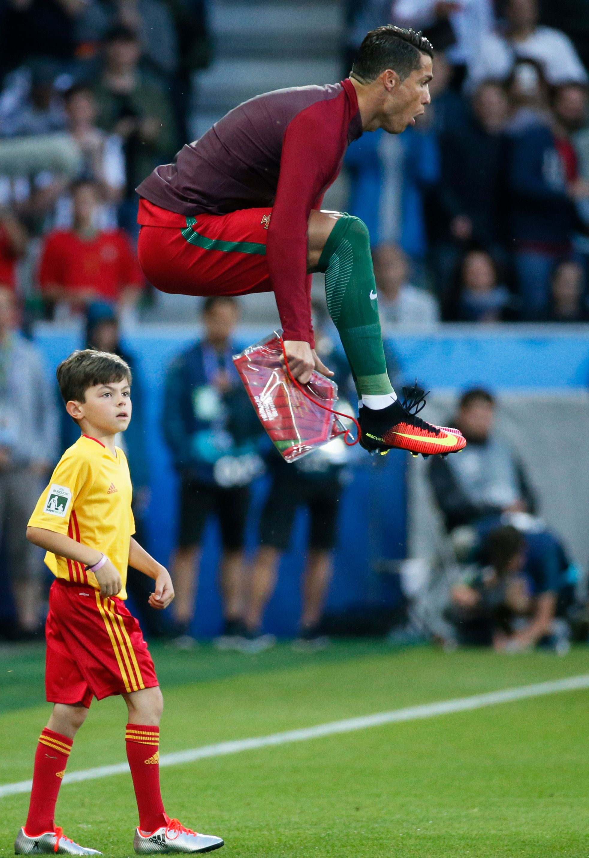 Portugal's Ronaldo jumping.