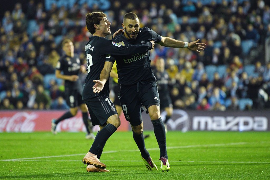 Karim Benzema and Alvaro Odriozola in action for Real Madrid