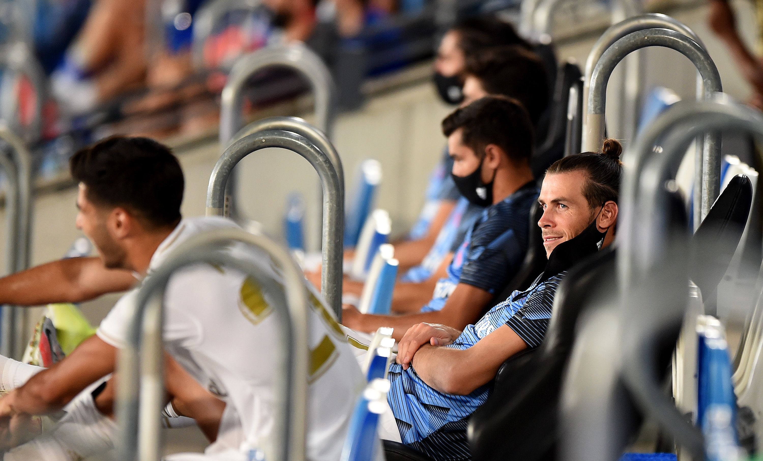 Bale smiles on the bench