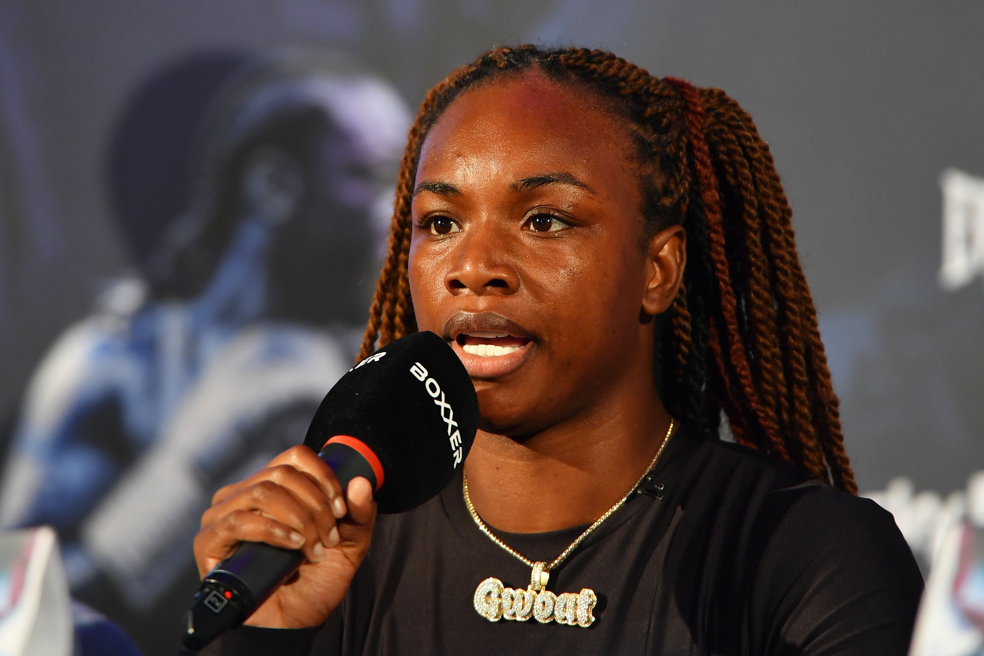 Claressa Shields talks during a press conference