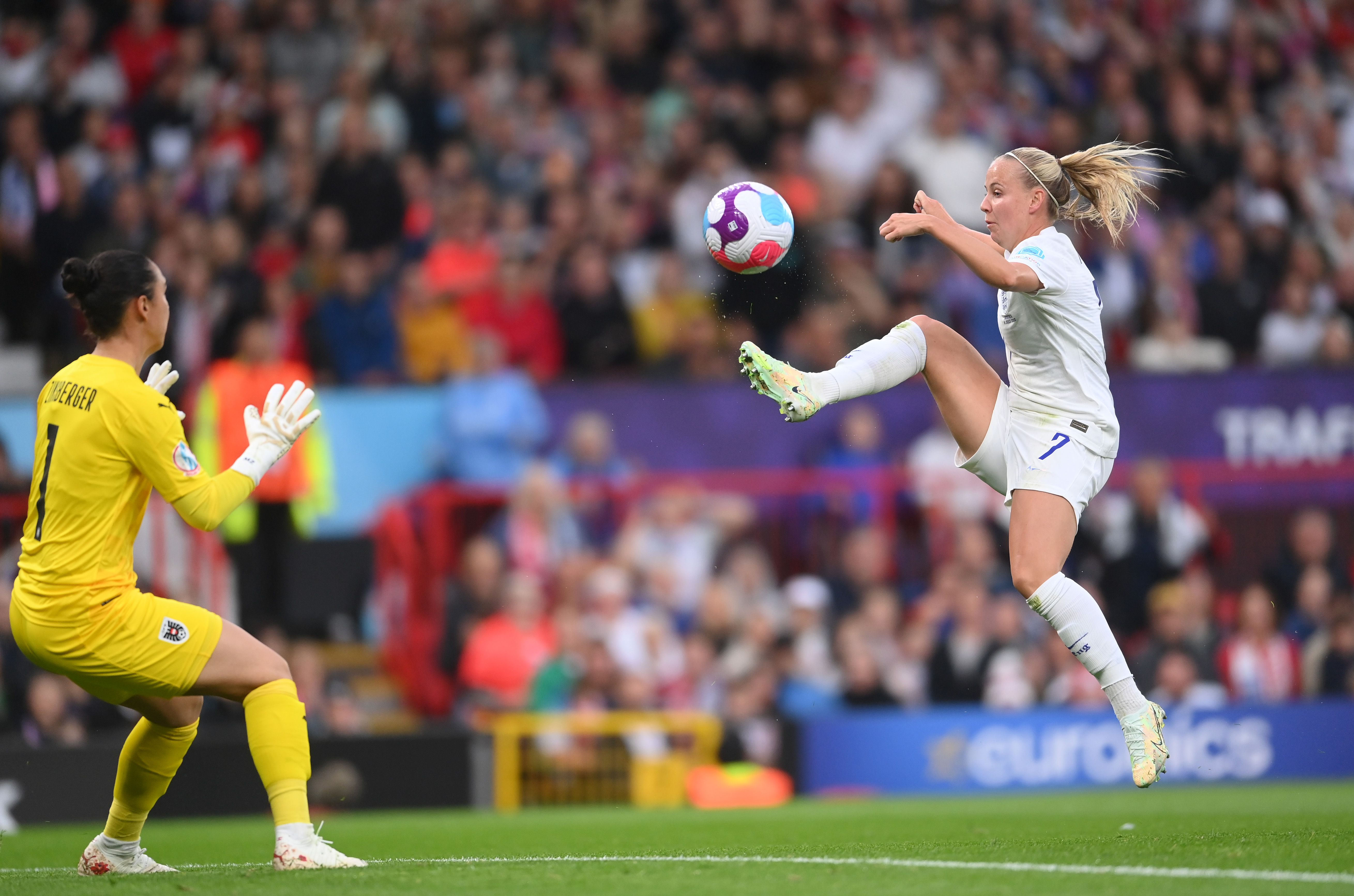 Beth Mead of England scores the first goal